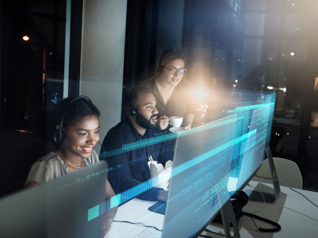 High angle shot of an IT support team working the late shift in their office