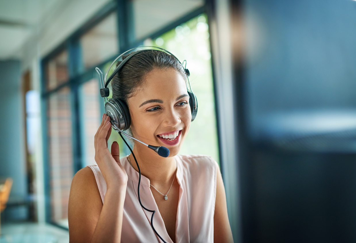 Shot of a young woman working in a call center